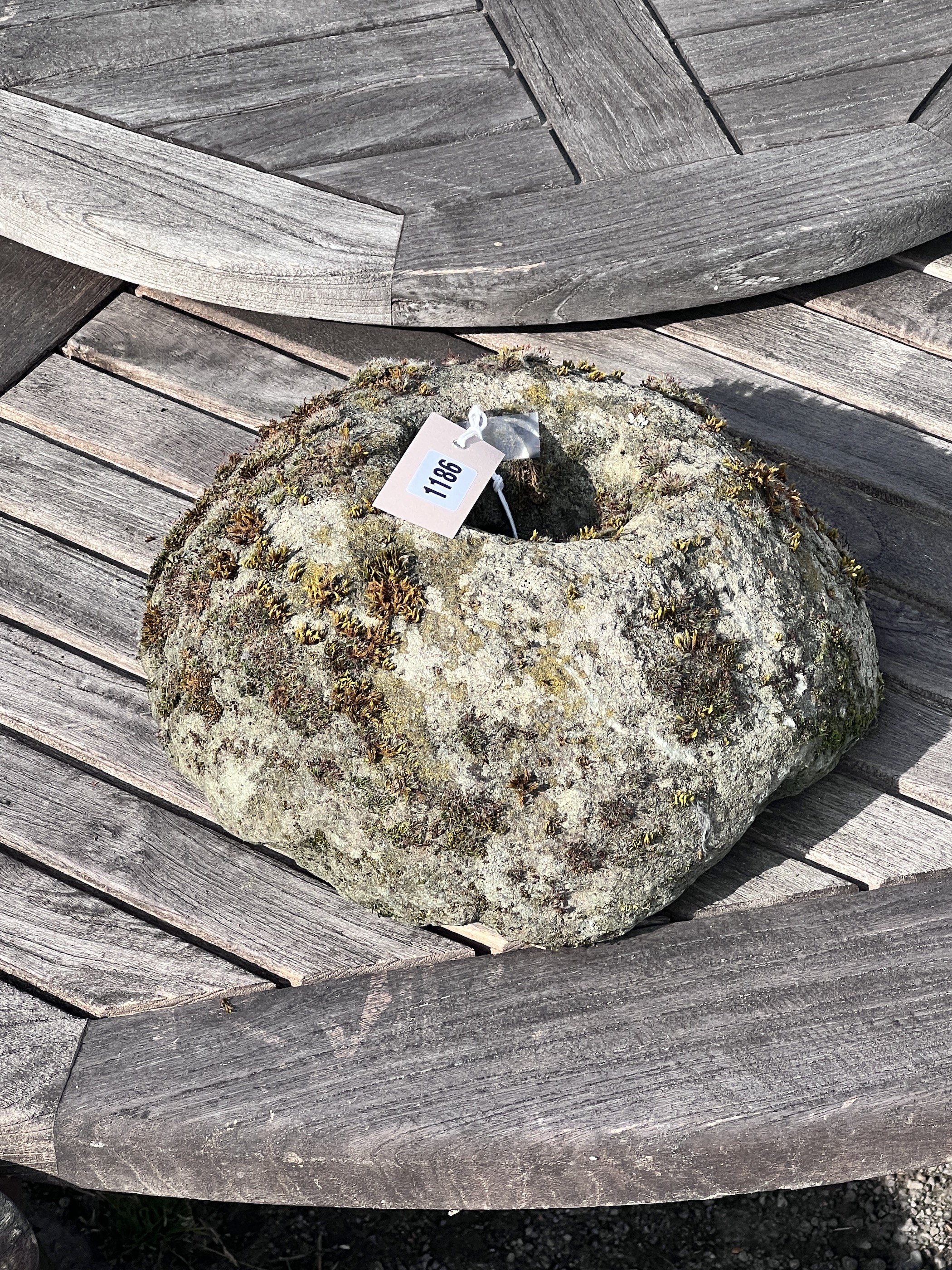 An Ancient puddingstone Quern, c.200 BC, diameter 30cm